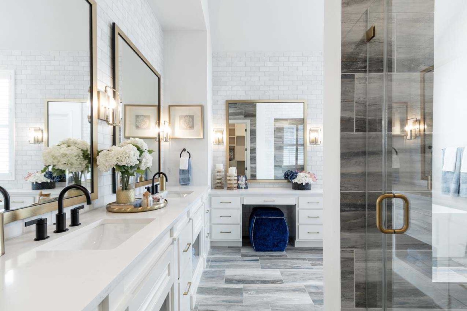 Master bathroom with tile, double vanity and glass shower